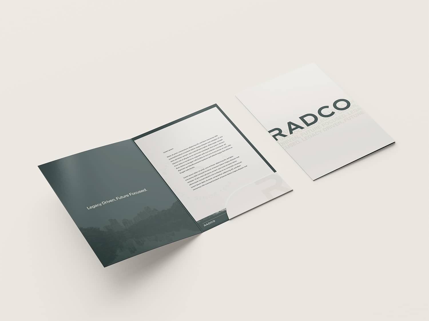 Open RADCO brochure with text and photo on the left page and a white cover on the right.