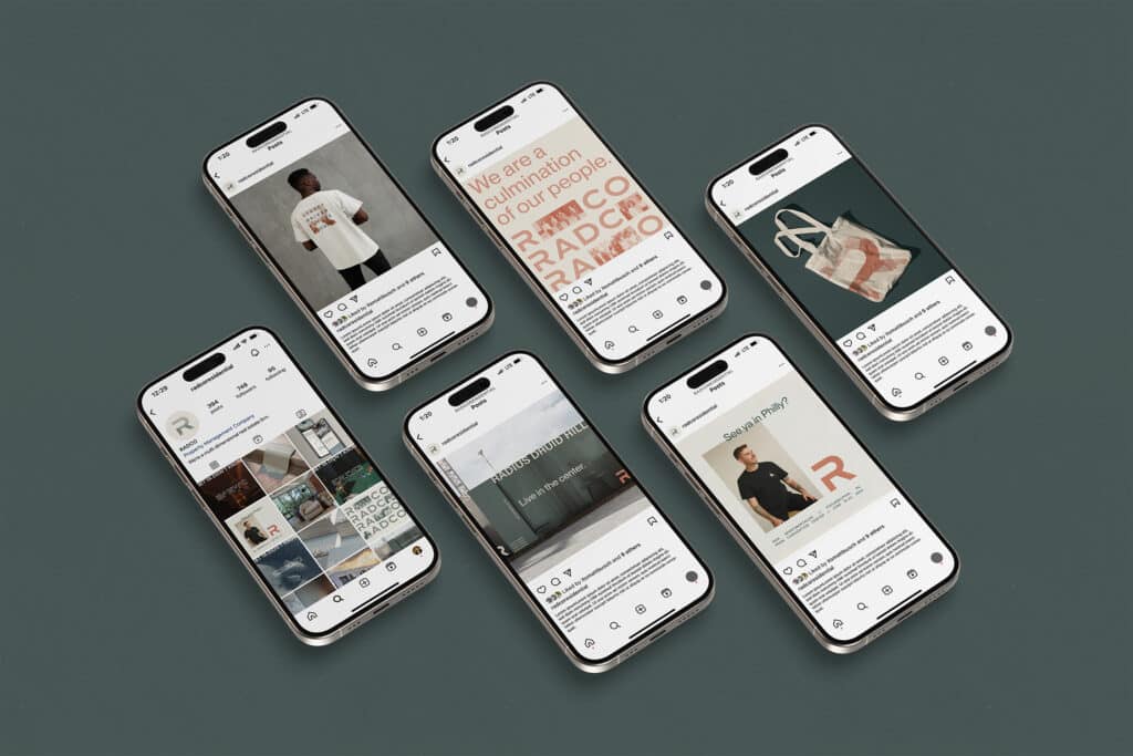 Six smartphones displaying Instagram posts featuring branding material, apparel, and tote bags with text and logos on a green surface.